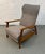 Relax in timeless Mid-Century Modern style with this beautifully crafted walnut reclining lounge chair and matching...