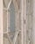 An elegant European two-part vitrine cabinet dating to circa 1790, distinguished by its refined proportions and finely...