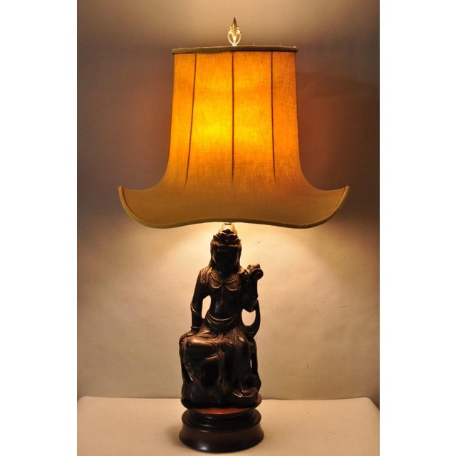 Vintage Chinoiserie Buddhist Kuan Yin Brown Ceramic Sculpture Figure Table Lamp w/ Shade. Circa Mid 20th Century....