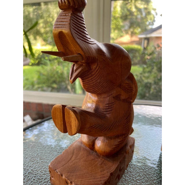 Mid Century Hand Carved Wooden Elephant BOOKENDS Folk Art with Tusks. Solid Teak Wood Set Vintage. These are intricately...
