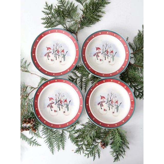 Add a touch of nostalgic charm to your holiday table with this set of four vintage Christmas snowman salad plates by Royal...