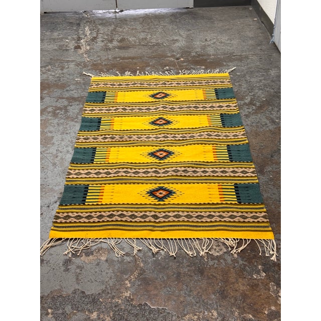 Design Plus Gallery presents a 4 ft 2 in × 7 ft 6 in Zapotec Style Geometric Area Rug. This vibrant geometric flatweave...