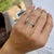 Gender: Ladies Metal Type: Platinum Ring Size: 7 Width: 2.25 mm Weight: 2.43 grams One ladies hand-engraved platinum...