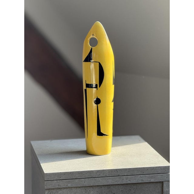 A rare ceramic vase from the Hungarian Zsolnay manufactory, designed by János Török around 1960. The slender, sculptural...