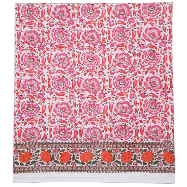 The classic Riyad design depicting elaborate flowers and vines stands out beautifully in the celebrated Indian color...