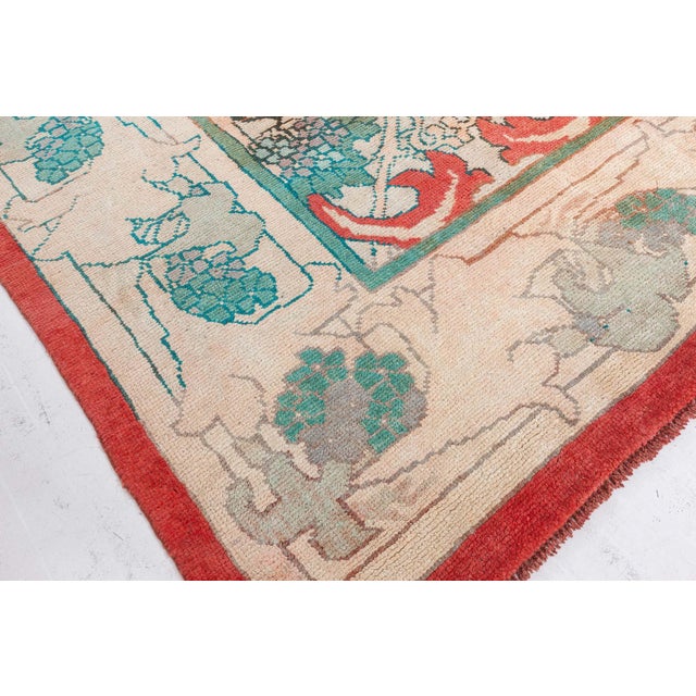 This striking vintage rug, handwoven in Ireland in the 1980s, is a vivid representation of the Arts and Crafts movement,...