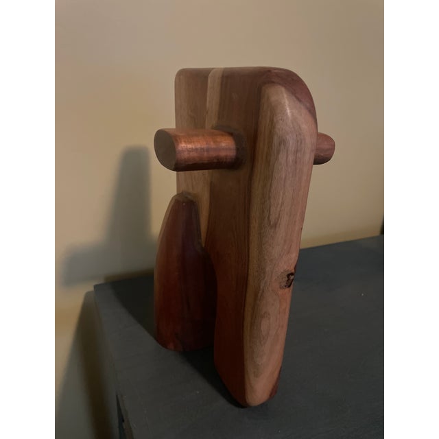 Handcrafted in India, made from Mango wood. This abstract piece is part of a celebrated collection that includes a...