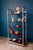 This freestanding bookcase from the 1970s-80s is appealing thanks to the warm combination of its chrome-plated steel and...