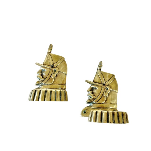 Very unusual pair of French brass wall hooks in the form of a French Napoleonic officer. The epaulets form the hook....