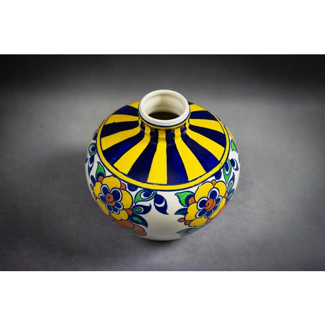 Trained at the École Nationale de Céramique in Sèvres, Catteau then worked at the Nymphenburg porcelain factory in Munich,...
