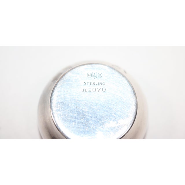 This product is an antique sterling silver Gorham salt spoon from the late 1800s, featuring a traditional pattern called...