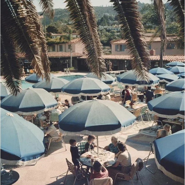 Outdoor Dining (1956) Limited Estate Stamped - Giant (Photo by Slim Aarons) Diners at an outdoor restaurant, San Diego,...