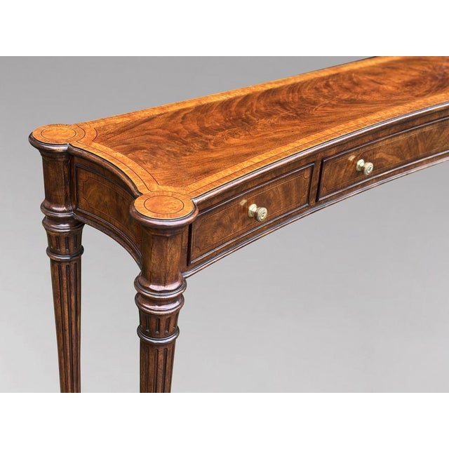 A late 20th century walnut inlaid console table by brights of nettlebed an elegant late 20th century console table by...