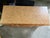 Vintage (1990s) solid wood dresser with three large drawers. Pretty detailing on the front. Top is wood-tone laminate, so...