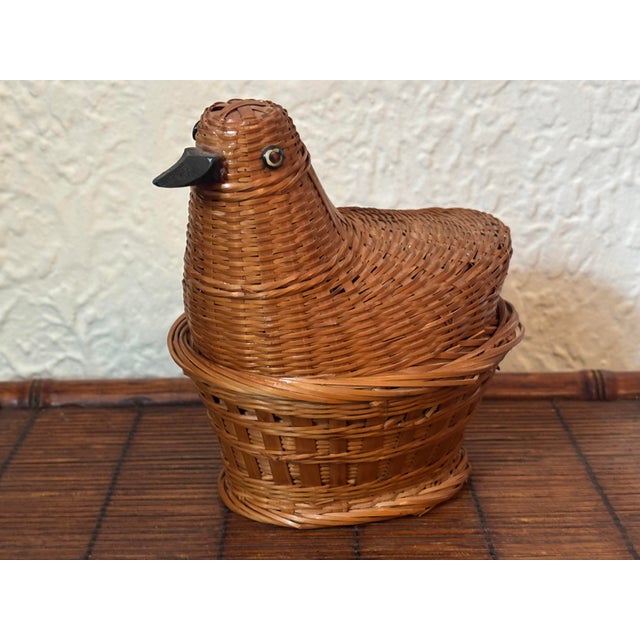 Charming vintage woven basket deputizing a resting bird on a nest. Most items found at Pub & Oasis are vintage and antique...