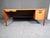 Mid-century modern writing desk Attributed Harvey Probber. This desk features walnut construction, ample leg room, and...