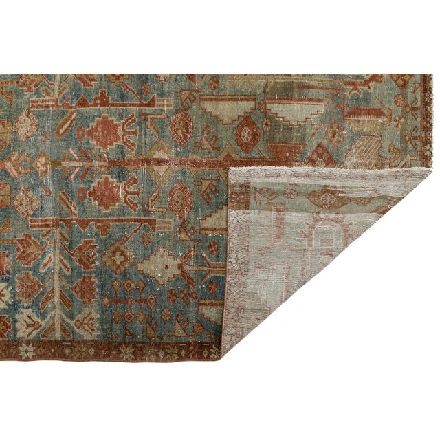 Elevate your space with the soulful sophistication of this antique Malayer wool rug. Dating back to the late 19th or early...