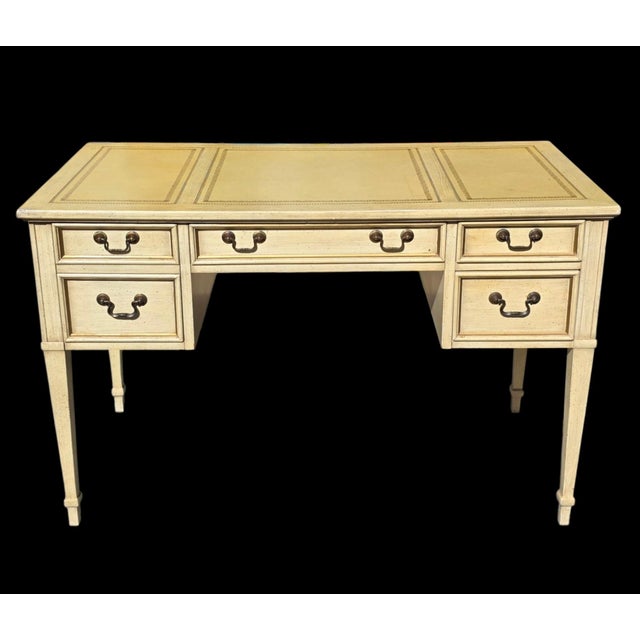 Sligh Furniture French Provincial / Louis XVI Revival writing desk, dating to approximately the 1960s–1970s. The desk...