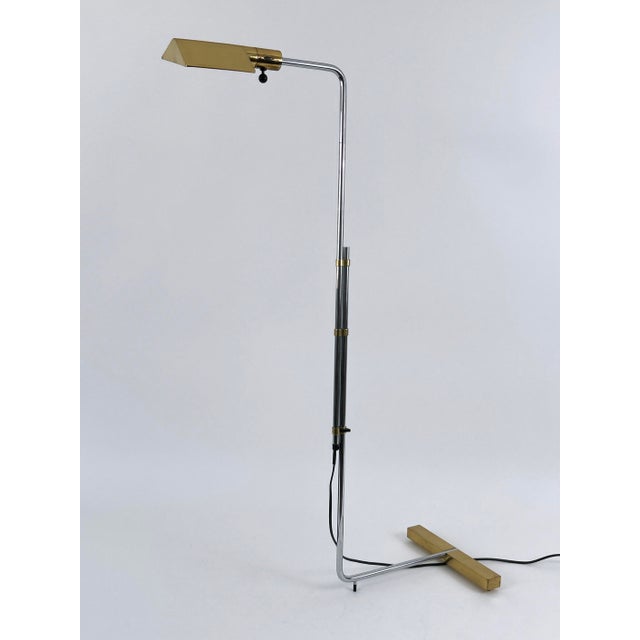 Absolutely iconic design piece. A must have for every design lovers. Rare and elegant mid-century modern telescopic and...