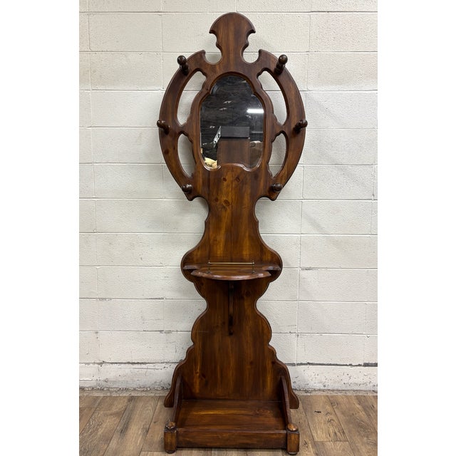 This is a beautiful antique Victorian style oak hall stand or hall tree with a spacious bottom tray, six hooks for hats,...