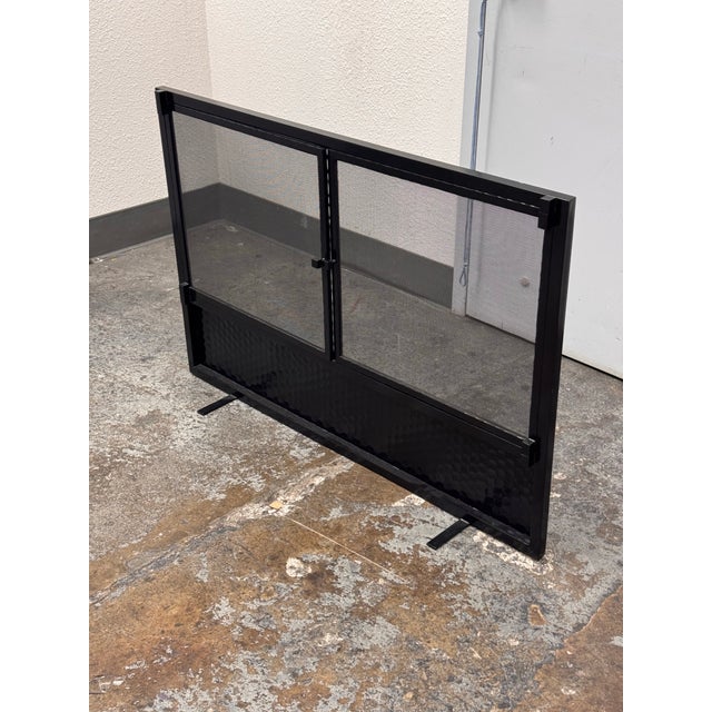 Design Plus Gallery presents the Titan Fireplace Screen by John Lyle. This sculptural fireplace screen reflects John...