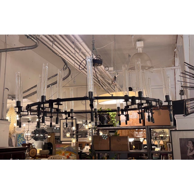 Design Plus Gallery presents a Fontanelle Round Chandelier by Jonathan Browning for Restoration Hardware. Inspired by...