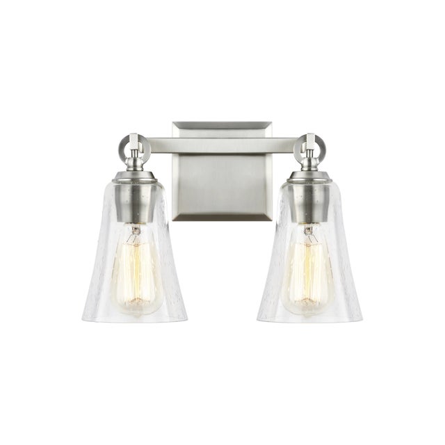 The Sean Lavin Monterro two light vanity fixture in satin nickel offers shadow-free lighting in your powder room, spa, or...