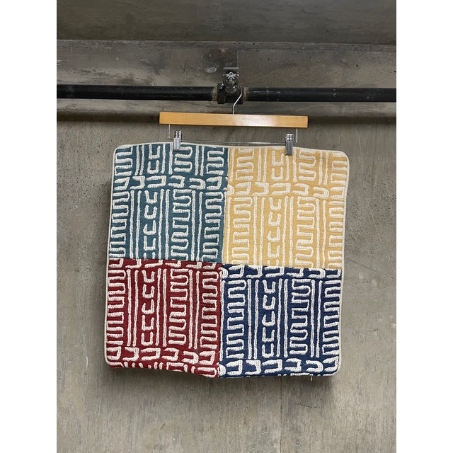 This newly crafted 22” X 22” accent/throw pillow features a fun and vibrant four-quadrant color blocked tribal-inspired...