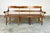 An American 19th century Pennsylvania pine & poplar Windsor bench with half spindles and single board plank seat. At six...