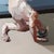 Contemporary Untitled II by Ale Casanova | Oil on canvas depicting a figure in a contorted pose on a couch. For Sale - Image 3 of 5