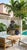 Vintage Hand-Carved Volcanic Stone Whimsical Monkey With Sombrero & Bananas Garden Statue For Sale - Image 10 of 12