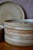 Here is a beautiful set of 12 glazed stoneware dinner plates by Niderviller, evoking the warmth of home cooking and happy...