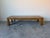 Striking 1970’s Parsons-style coffee table executed in a beautifully bookmatched burl wood veneer, attributed to the...