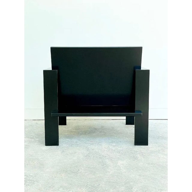 Lounge chair 01 Black by Goons Dimensions: W 70 x D 68 x H 64.6 cm. Materials: Wood. Dimensions can be adjusted +/- 10 cm.