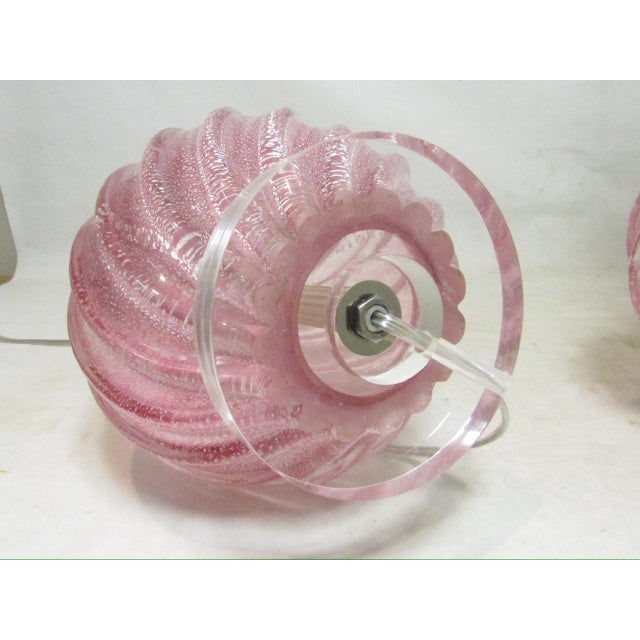 Pair of vintage rose Murano art glass lamps, c.1940’s The body is hand blown, featuring a prominent twisted body showing a...