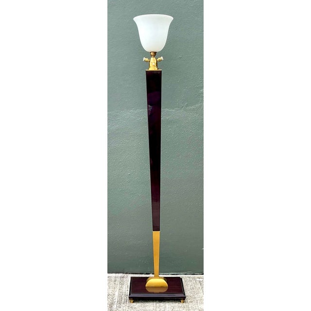 This striking vintage floor lamp is a sophisticated marriage of exotic materials and streamlined architectural form. The...