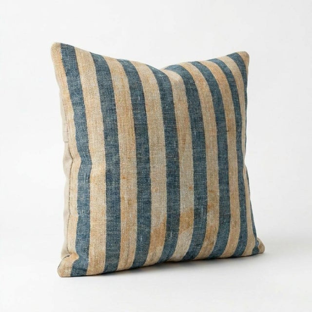 This beautiful 20'' x 20'' pillow cover was made from an authentic Turkish rug. Bright colors of wool adorn the front of...