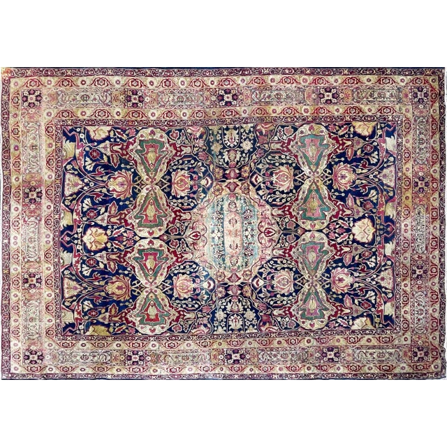 Discover the allure of the Kermanshah or Laver Kerman rug, a Southeast Persian treasure that captures a pictorial...