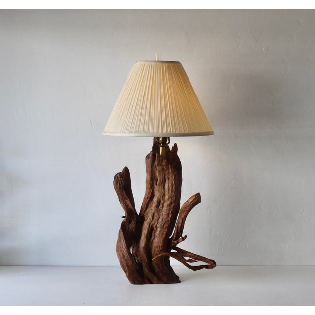 Large Mid-century Driftwood Table Lamp. Fabulous grainy wood that has a lacquer finish. Organic sculptural form created...