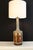 Unusual ceramic table lamp. (Aldo Londi Influence). Beautiful art form with embossed figurines,. glazed with a chestnut...