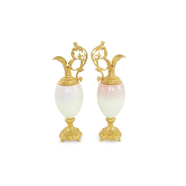 Late 19th century pair of ormolu mounted two handled sevres style decorative vase . Each one featuring an ovoid baluster...