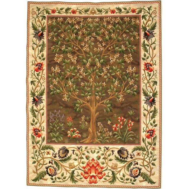 This tapestry is also known as The Garden and is from an embroidered wool portiere designed by John Henry Dearle...
