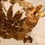 Ceiling lamp with floral motifs, designed by Willy Daro in the 1970s. It features a lower crown of water lilies that...