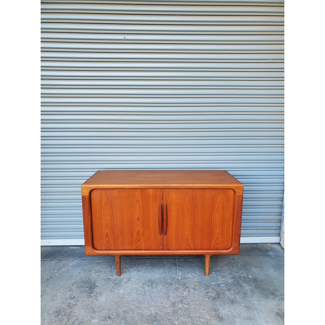 Absolutely stunning, vintage mid-century style teak credenza. The credenza is made out beautiful teak with great wood...