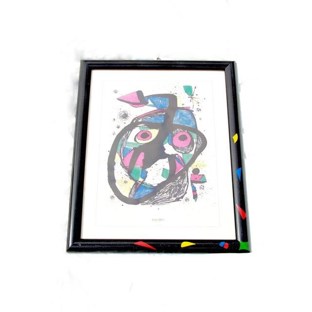 A striking lithograph by Joan Miró, printed in Italy in 1988, capturing the bold and poetic visual language of one of the...