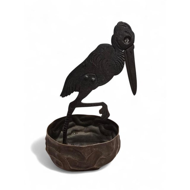 An unusual and highly decorative Arts & Crafts cigar cutter in the form of a stork, attributed to Hugo Berger (Goberg) and...