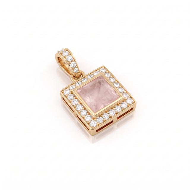 This delicate pendant showcases a soft, blush-pink square-cut rose quartz at its heart, framed by a sparkling halo of...