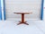 Danish Modern Teak Extension Dining Table This stunning 1960s Danish Modern dining table is a true testament to...
