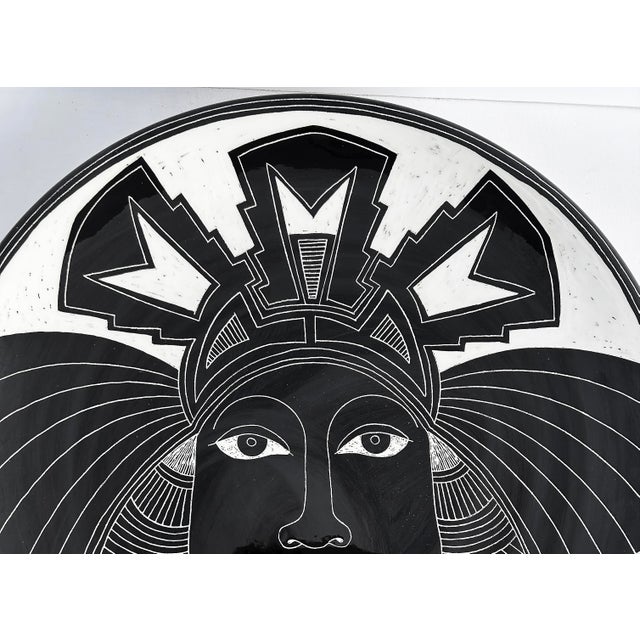 Vintage Curras Brothers Hand-painted Pottery Charger, Signed, 5 Faces Available Offered for sale is a vintage Ronald...