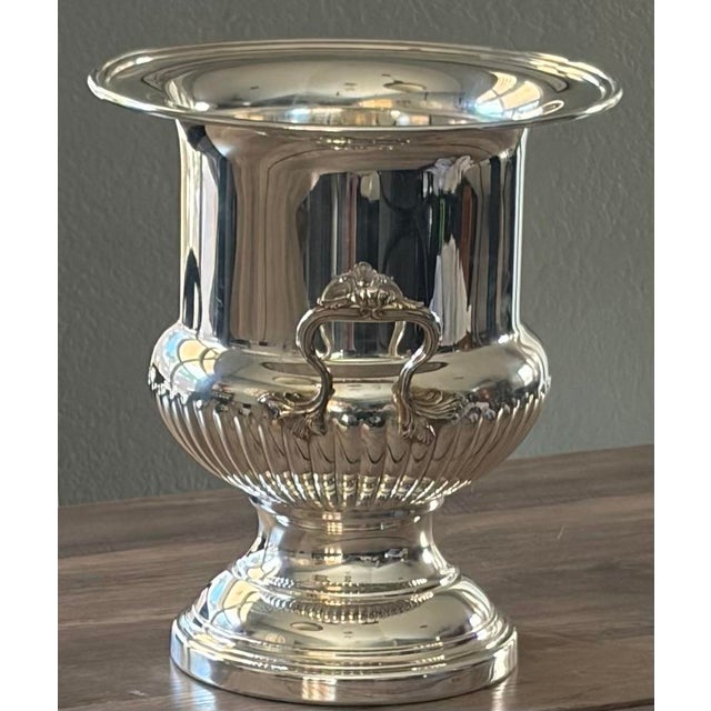 A superb vintage French silverplate champagne bucket or wine cooler by acclaimed Fleuron Christofle, France, circa 1950....